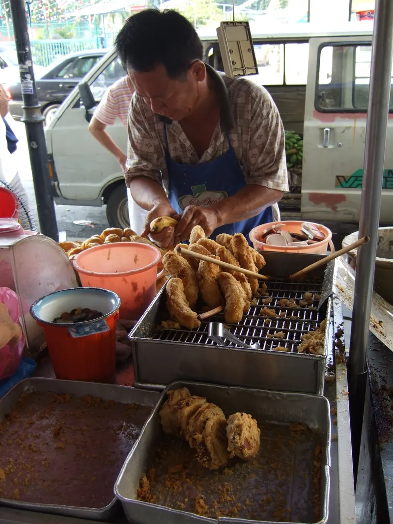 Battered fried banana. Crispy on the outside, sweet and mushy on the inside.